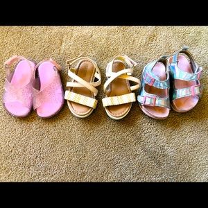 3 pairs of girls shoes.